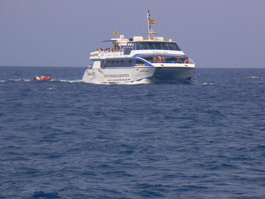 From Puerto Rico: Boat trip along the coast w/ Food & Drinks - Catamaran Views Off Puerto Rico de Gran Canaria