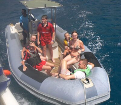 From Puerto Rico: Boat trip along the coast w/ Food & Drinks - The Real Value Play: Full Park vs Basic Pack