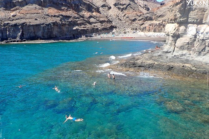 Kayak & Snorkeling Tour in Caves in Mogan - What you get for $77.43: gear, snacks, insurance, and expert guidance